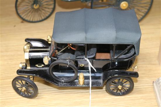 A model of a Benz Motorwagon and two models of veteran cars tallest 17.5cm